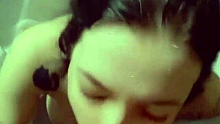 Big ass babe gives a sensual blowjob in the bathroom