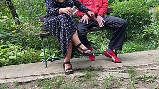 park bench milf sneaks handjob on huge cock till it fills her glass