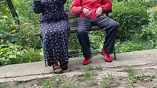 park bench milf sneaks handjob on huge cock till it fills her glass