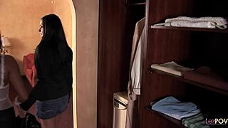 Tanned lesbian maid rams glass dildo in lover's asshole