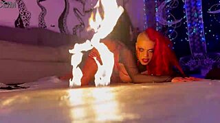 Vampire babe in costume dances seductively showing off huge fake tits and pierced nipples