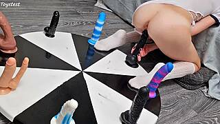 Petite stepsister spins wheel of dildos to claim her massive rough orgasm prize
