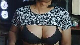 mitha strokes her cock alone in the office