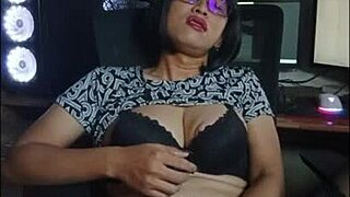 mitha strokes her cock alone in the office