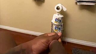 i stroke my huge black monster cock til thick pre cum drips