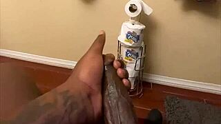 i stroke my huge black monster cock til thick pre cum drips
