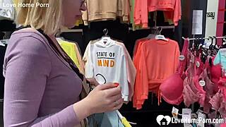 Girlfriend Kneels Sucking Cock Deep in Crowded Shop Changing Booth