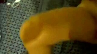 The crossdressing prostitute kneels eagerly, sucking cock with slutty hunger.