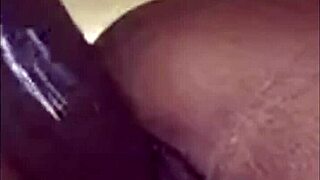 yo babe, watch this muscular ebony stretch her big wet pussy lips with huge dildo