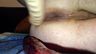 Beer bottle dildo stretches her ass in wild anal toy play