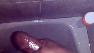 stroking my throbbing cock hard in the steamy shower