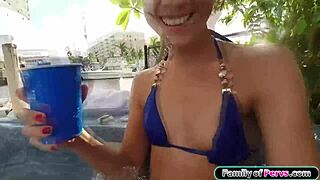 stepsis spreads wide while i finger her shaved pussy in the jacuzzi