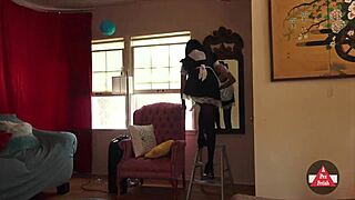 french maid carefully vacuums every corner of the house