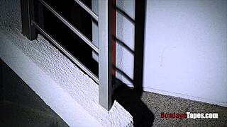 She's tied up in the dark for rough femdom riding and spanking.