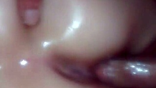 Oiled pussy gets pounded by hard cock