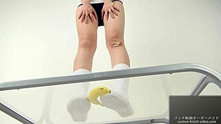 asian japanese girl crushes banana with feet in fetish