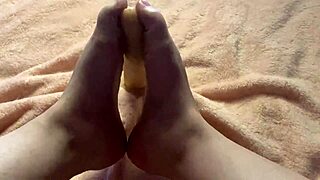 slow, teasing footjob from a curvy barefoot girl in this homemade fetish video
