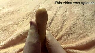 slow, teasing footjob from a curvy barefoot girl in this homemade fetish video