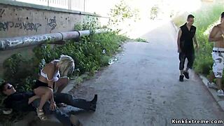 blonde bound in latex outdoors 😈