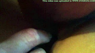 i'm licking her pussy with my tongue while she uses a dildo toy on herself.