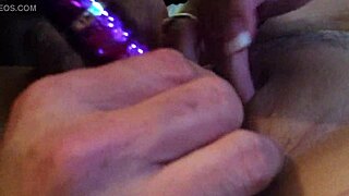 i'm licking her pussy with my tongue while she uses a dildo toy on herself.