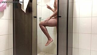 Handsome man takes shower with beautiful body in bathroom by Ronaldo GGG