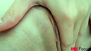 teen plays with her ass using dildo