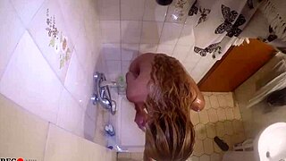 Curious couple caught sharing a steamy shower moment together