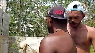 Two guys jerking off in abandoned construction site