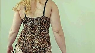 Blonde tries on leopard lingerie and bikinis