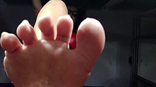 Worship my feet, slave, in this femdom fetish session.