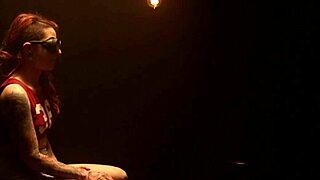 Tattooed redhead says, Whip me harder while I'm tied up!