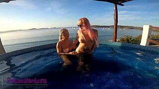 lesbian trio in jacuzzi with paradise view