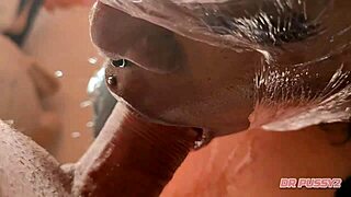 an african submissive feels intense pleasure during deepthroat, saliva dripping slowly in slow motion