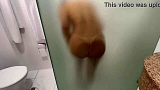 in the shared hostel bathroom, we showered and i gave her a handjob, feeling so emotional