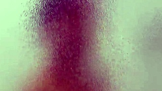 in the shared hostel bathroom, we showered and i gave her a handjob, feeling so emotional