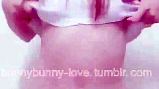 Ai Lu Lu, that asian slut in bunny outfit, dancing sexy with her pierced tits?