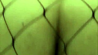 Curvy woman rides dildo in fishnet stockings