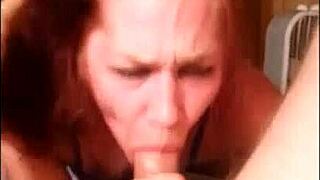 in this homemade scene, a redhead milf gets double teamed