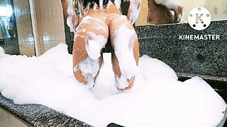 Latina Woman Enjoys Relaxing Bath in Bathtub