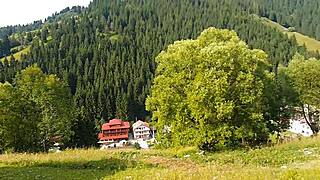 Sensual self-pleasure with sex toys in a scenic cabin