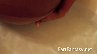 amber star creates stinky fart bubbles in the bath while getting her ass worshiped