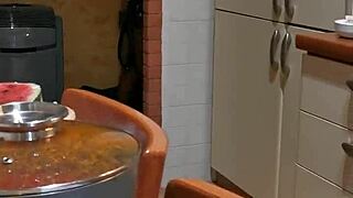 Mature wife Teresa cleans the kitchen in homemade video