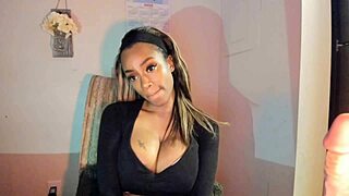 Tattooed milf with big tits playing with her pussy