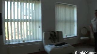 Cheating English milf Lady Sonia unveils her oversized boobs in lingerie.