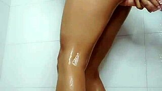 latina woman enjoys private moment in the bathroom