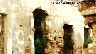 petite girl undresses teasingly in outdoor striptease with ripped clothes