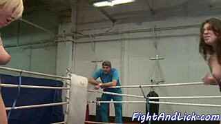 Two voluptuous lesbians engage in wrestling and combat