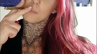 Tattooed wife teases with sensual smoking show