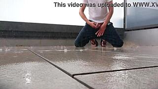 Masked Beauty Masturbates Hard in the Rain on Balcony Wearing Jeans and Flip Flops